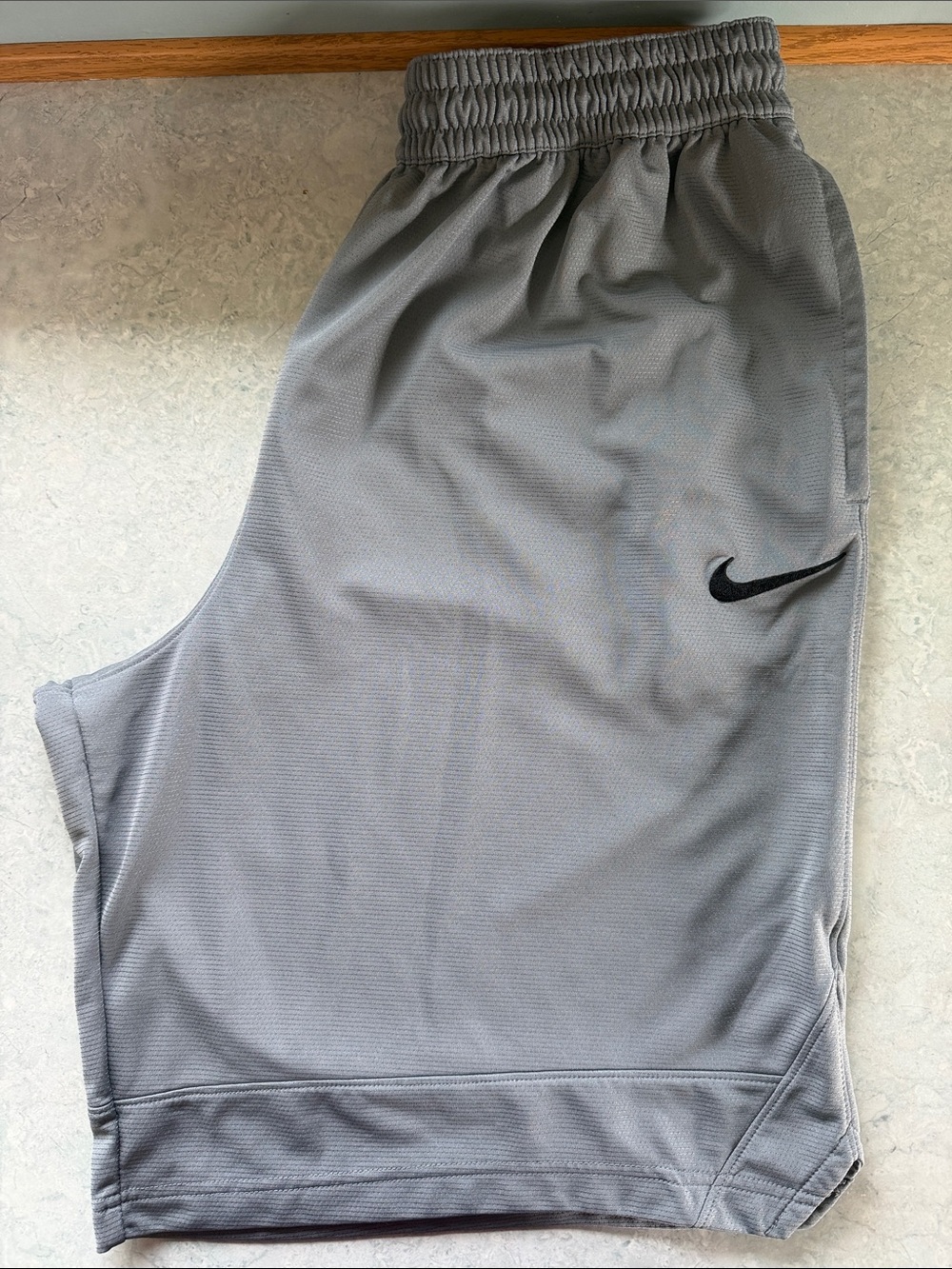 Nike Men's Gray Athletic Shorts with Black Swoosh